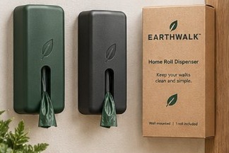 Forest green and charcoal wall-mounted EarthWalk dispensers beside the kraft box.